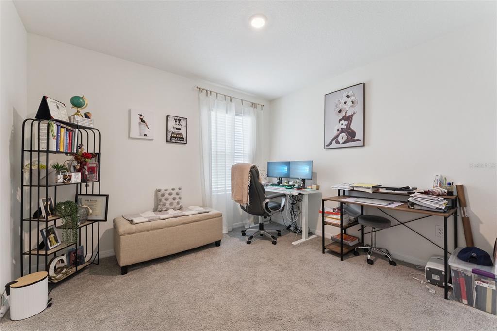 1502 Bitteroot Street Kissimmee, FL 34744 - Photo 20 of 29 a view of a workspace with a window