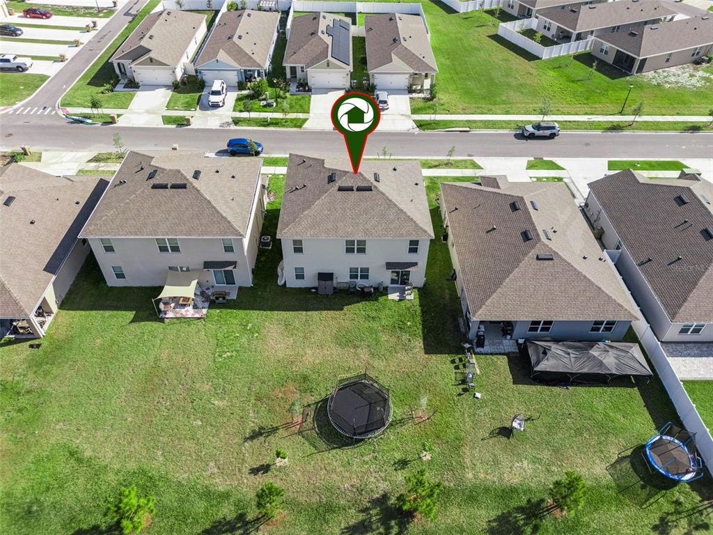 1502 Bitteroot Street Kissimmee, FL 34744 - Photo 24 of 29 an aerial view of a house with swimming pool