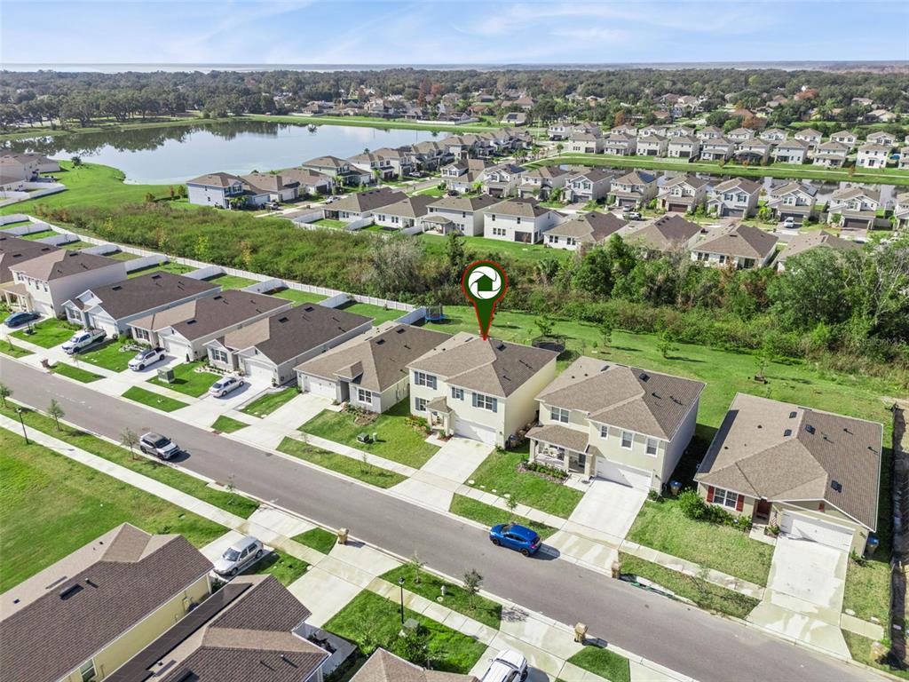 1502 Bitteroot Street Kissimmee, FL 34744 - Photo 26 of 29 an aerial view of a city with lots of residential buildings