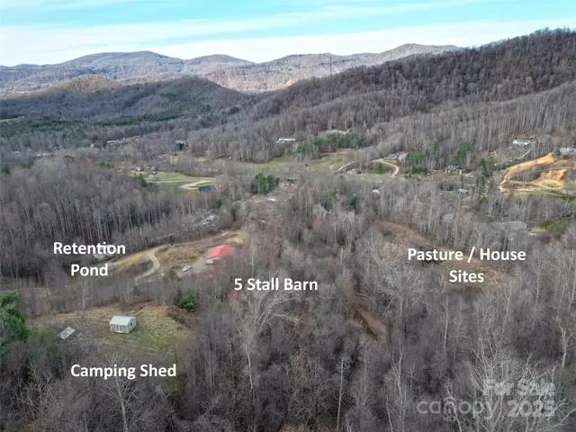 a view of a town with mountains in the background
