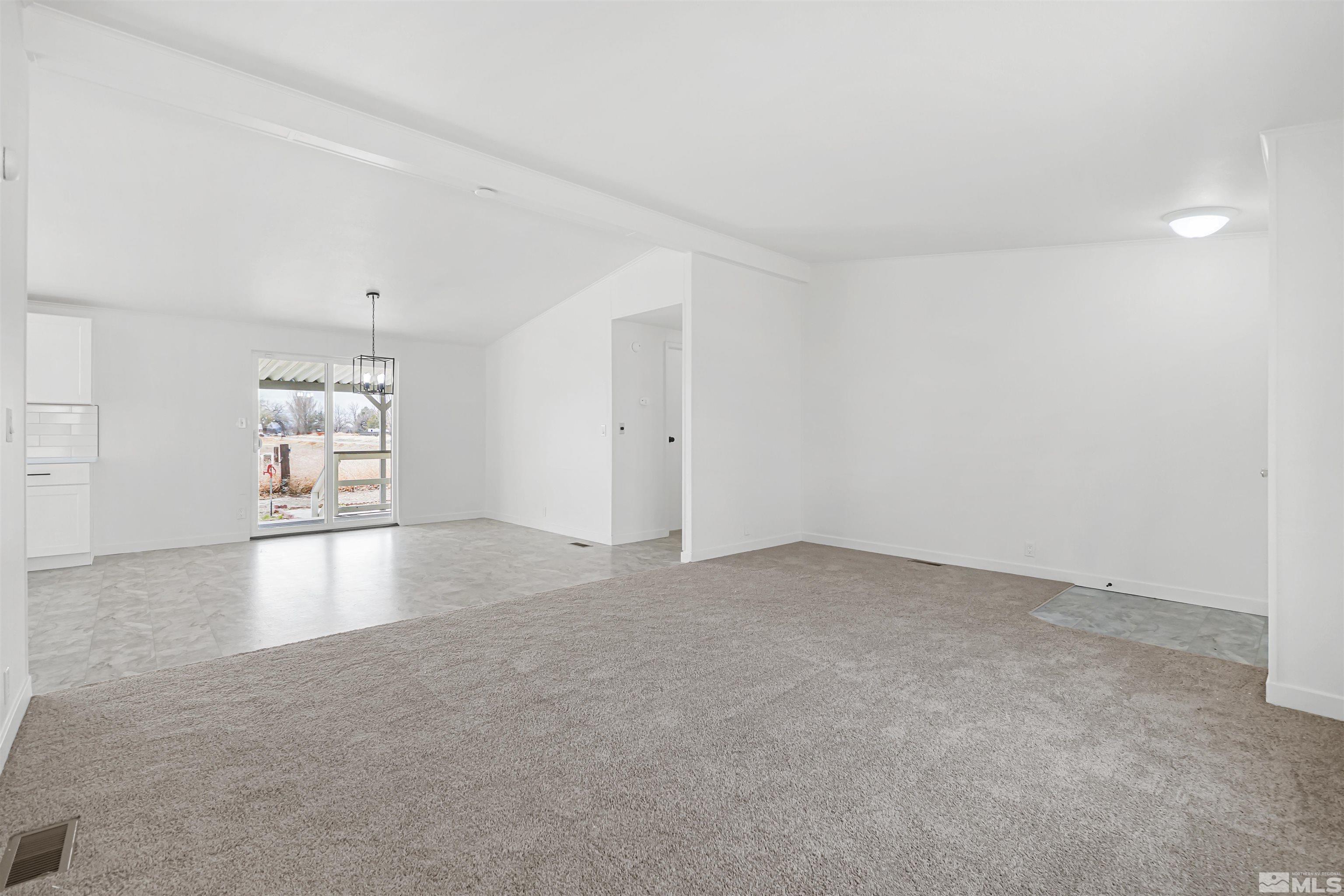 3975 Alcorn Road Fallon, NV 89406 - Photo 11 of 21 an empty room with a natural light