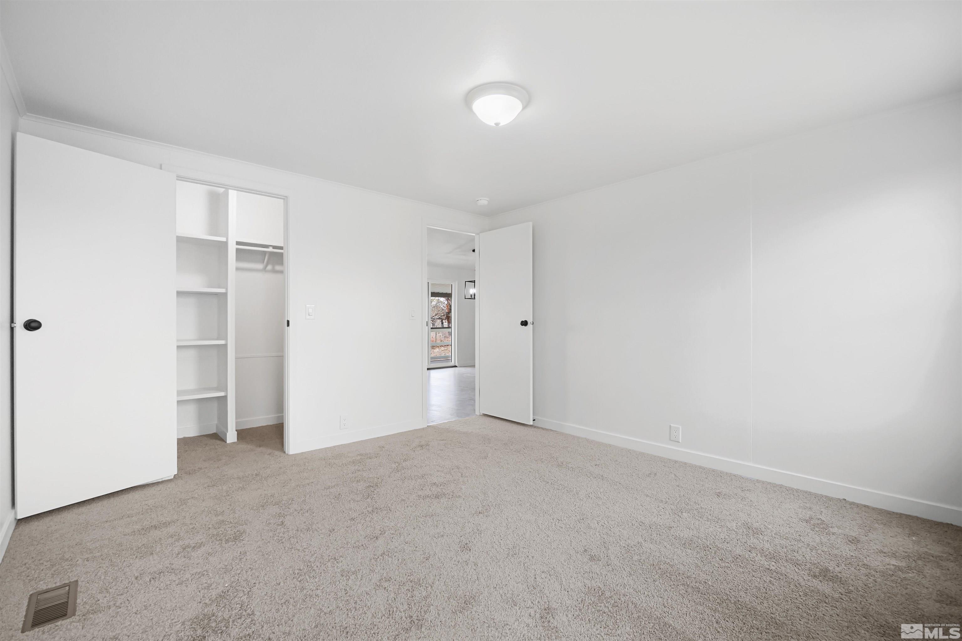 3975 Alcorn Road Fallon, NV 89406 - Photo 16 of 21 an empty room with closet and entryway
