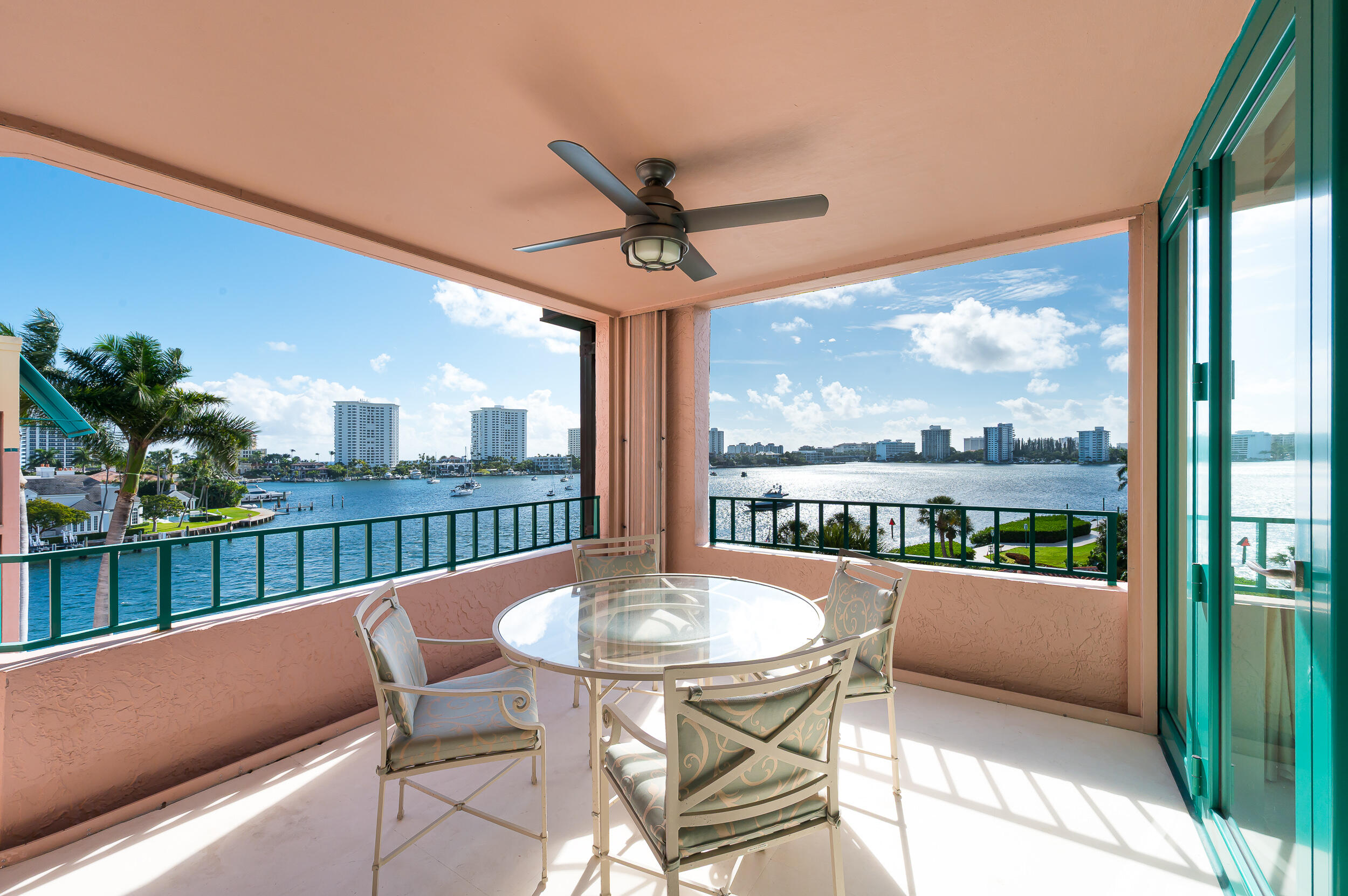 140 Southeast 5th Avenue, Unit PH50 Boca Raton, FL 33432 - Photo 3 of 52 a balcony with furniture and city view