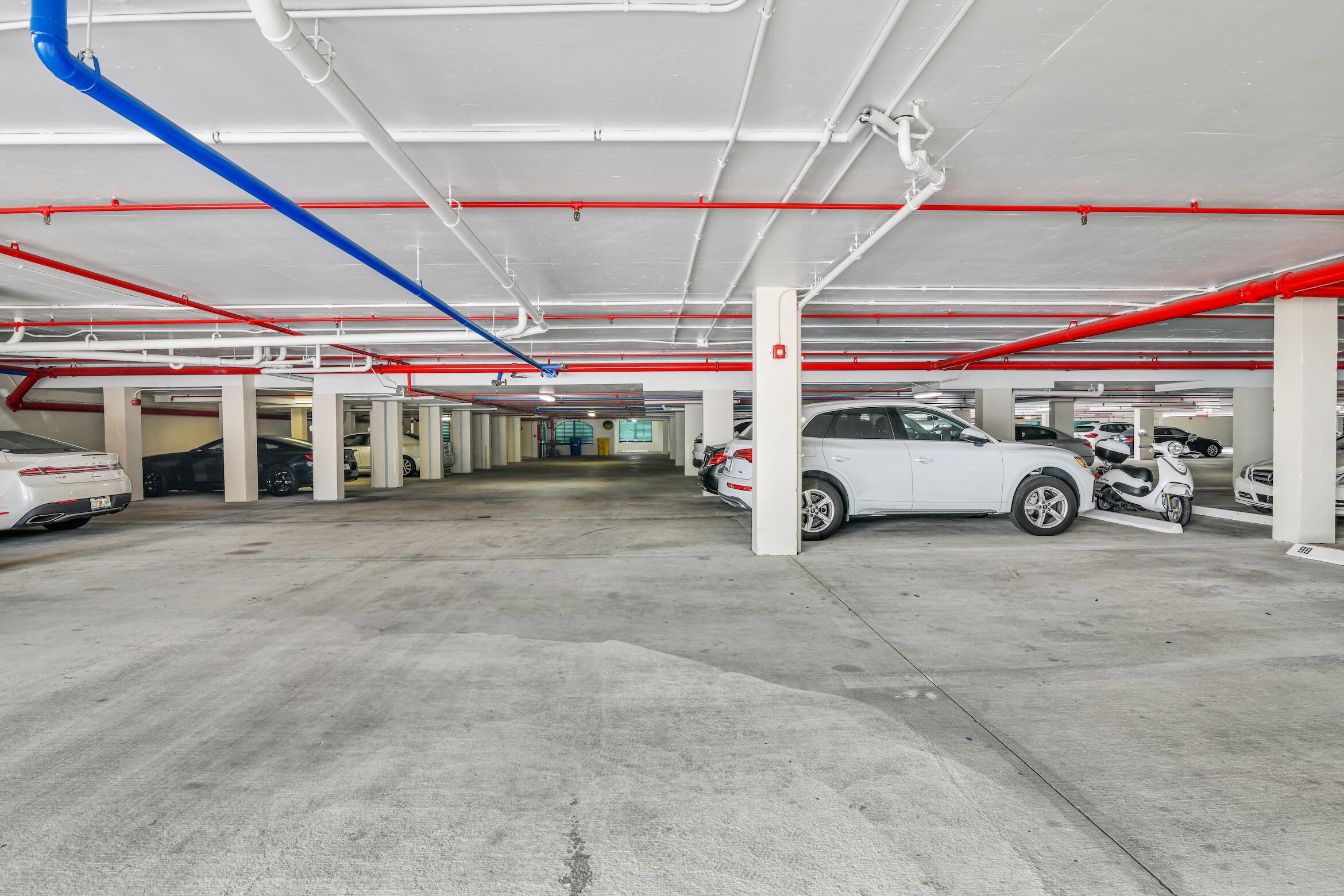 140 Southeast 5th Avenue, Unit PH50 Boca Raton, FL 33432 - Photo 40 of 52 a car parked in garage