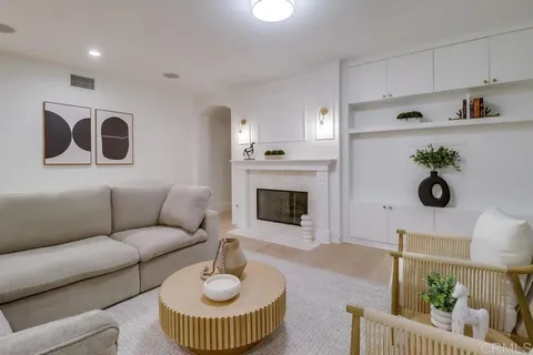 a kitchen with a sink stainless steel appliances and cabinets