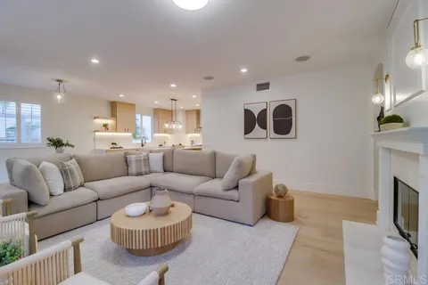a kitchen with a sink stove and wooden cabinets