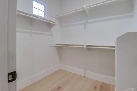 a view of a patio with couches chairs and a table with garden view