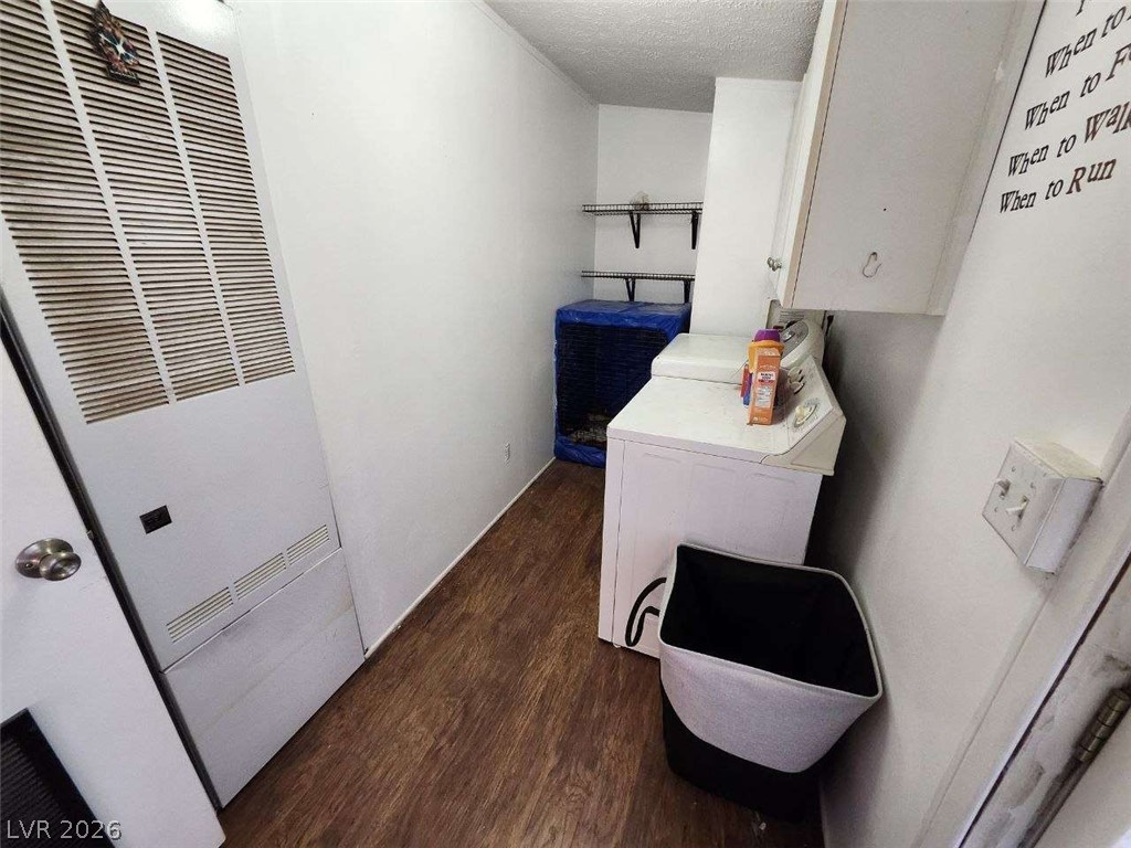 942 Holt Caliente, NV 89008 - Photo 14 of 22 Functional laundry space with convenient shelving for organization and easy-care flooring.