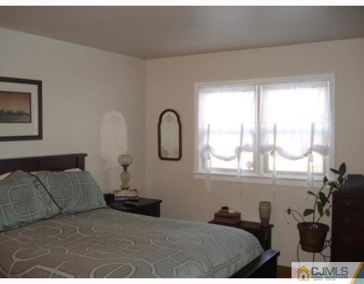 207 Princeton Road Old Bridge, NJ 08859 - Photo 6 of 10 a bedroom with bed and a window