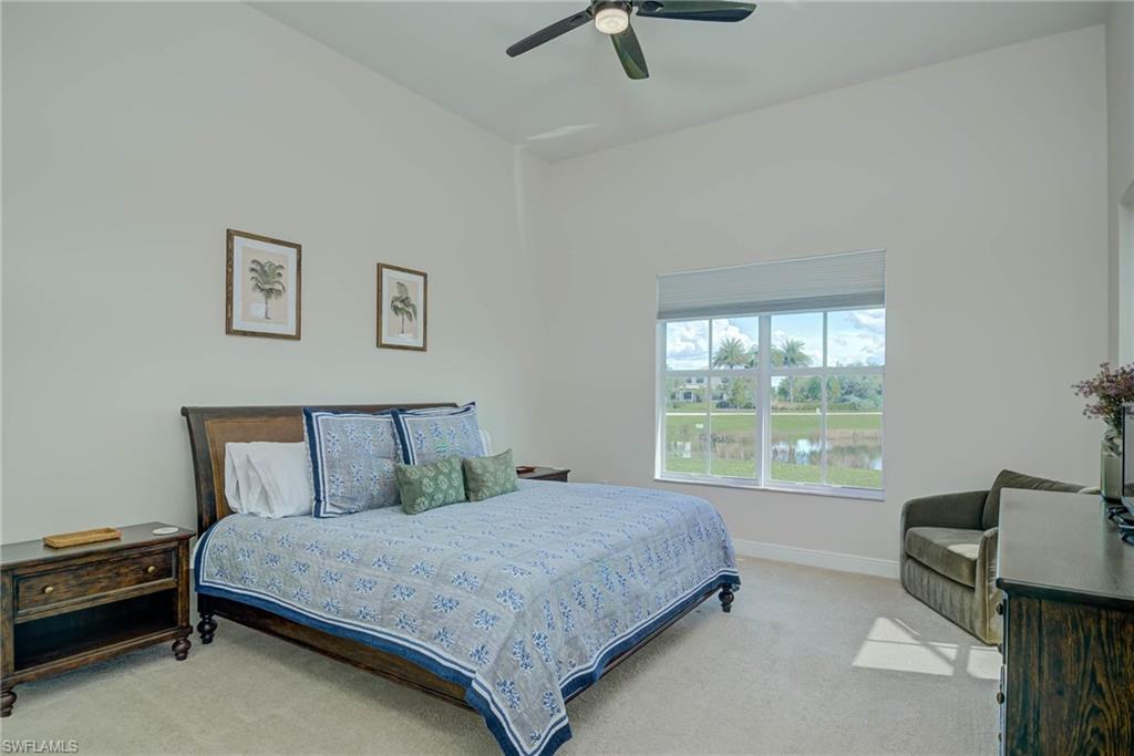 5254 Messina Street Ave Maria, FL 34142 - Photo 13 of 32 a bedroom with a bed and a window