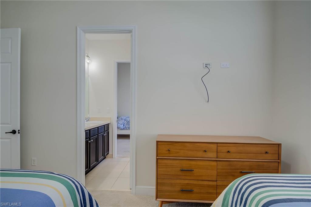 5254 Messina Street Ave Maria, FL 34142 - Photo 22 of 32 a view of walk in closet