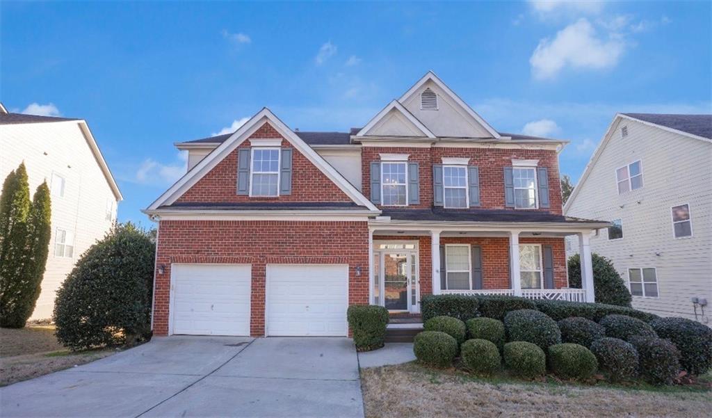a front view of house with yard