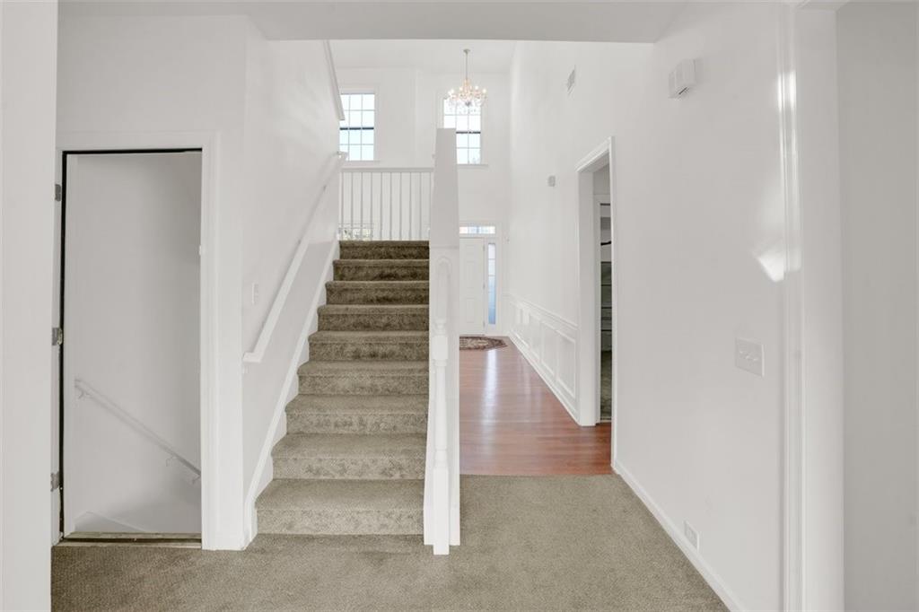 5280 Lakerock Way Southwest Atlanta, GA 30331 - Photo 15 of 33 a view of a hallway with staircase