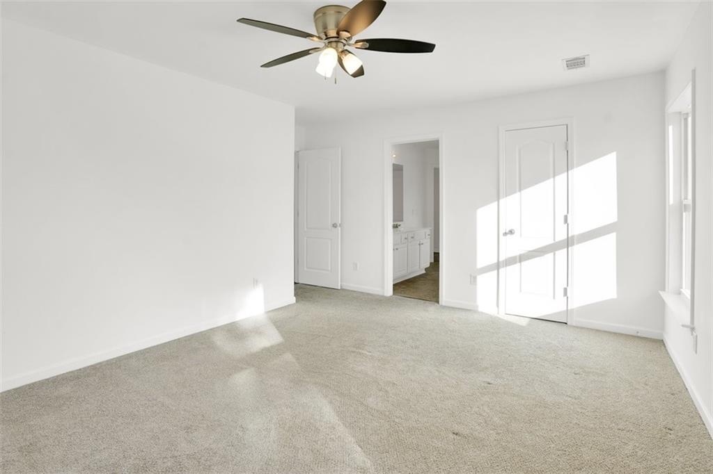 5280 Lakerock Way Southwest Atlanta, GA 30331 - Photo 17 of 33 a view of an empty room with a window