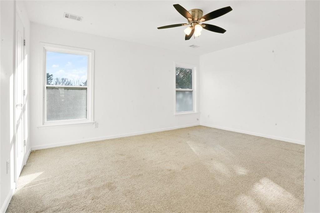5280 Lakerock Way Southwest Atlanta, GA 30331 - Photo 18 of 33 a view of an empty room with a window