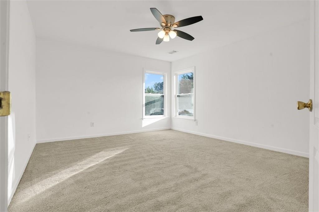 5280 Lakerock Way Southwest Atlanta, GA 30331 - Photo 25 of 33 a view of an empty room with a window