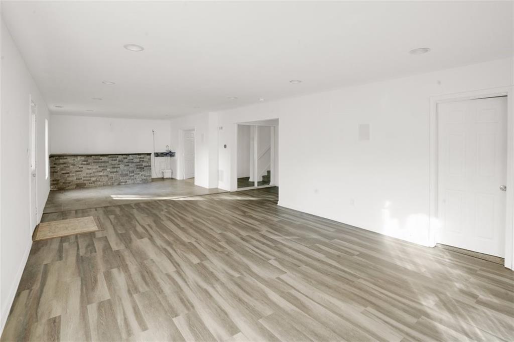 5280 Lakerock Way Southwest Atlanta, GA 30331 - Photo 29 of 33 a view of empty room with wooden floor