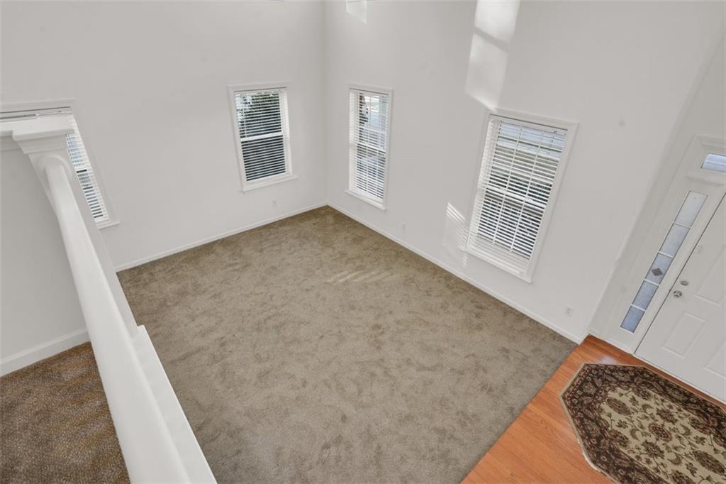 5280 Lakerock Way Southwest Atlanta, GA 30331 - Photo 7 of 33 a view of an empty room with windows