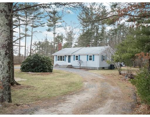 21 Neck Road Rochester, MA 02770 - Photo 1 of 23 a front view of a house with a garden
