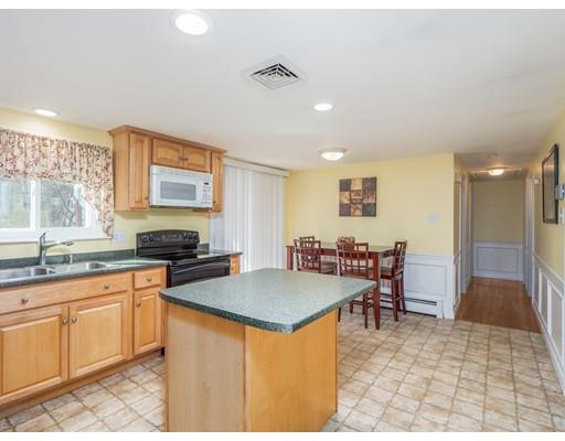 21 Neck Road Rochester, MA 02770 - Photo 4 of 23 a kitchen with stainless steel appliances granite countertop a stove a sink dishwasher and a refrigerator with wooden floor