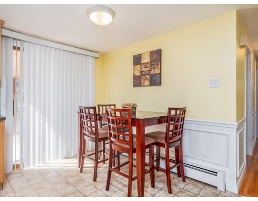 21 Neck Road Rochester, MA 02770 - Photo 7 of 23 a view of a dining room with furniture and a window
