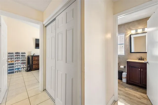 a kitchen with a sink stove and refrigerator
