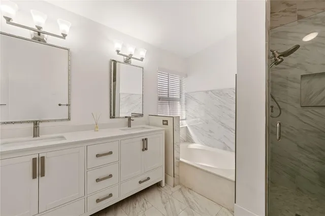 a bedroom with a bed and a television