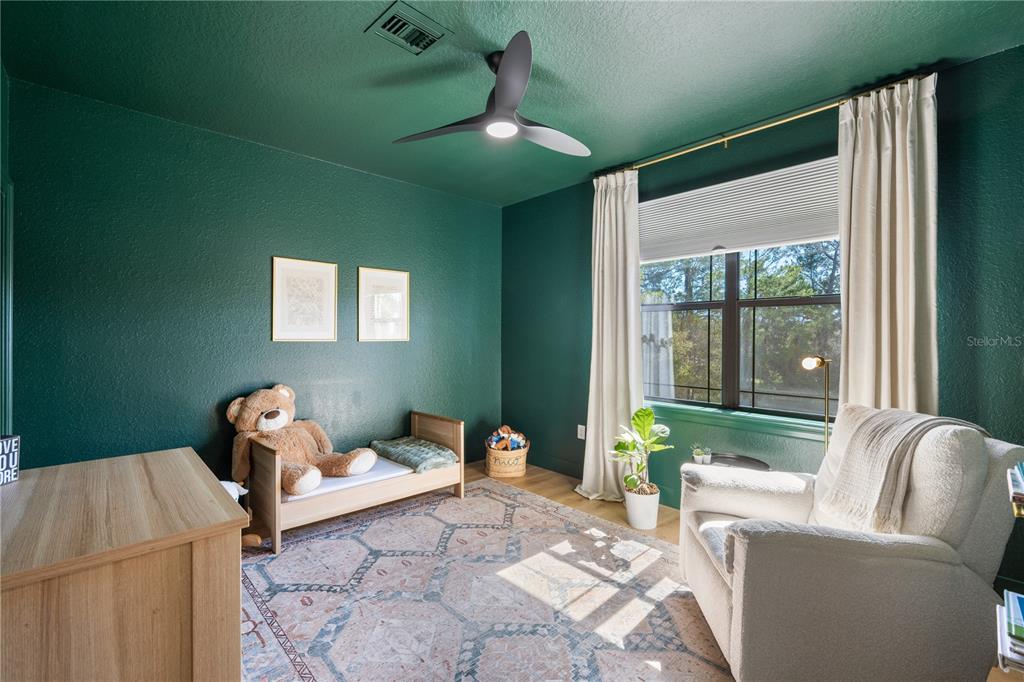 5351 Carson Street St. Cloud, FL 34771 - Photo 30 of 54 a living room with furniture and window