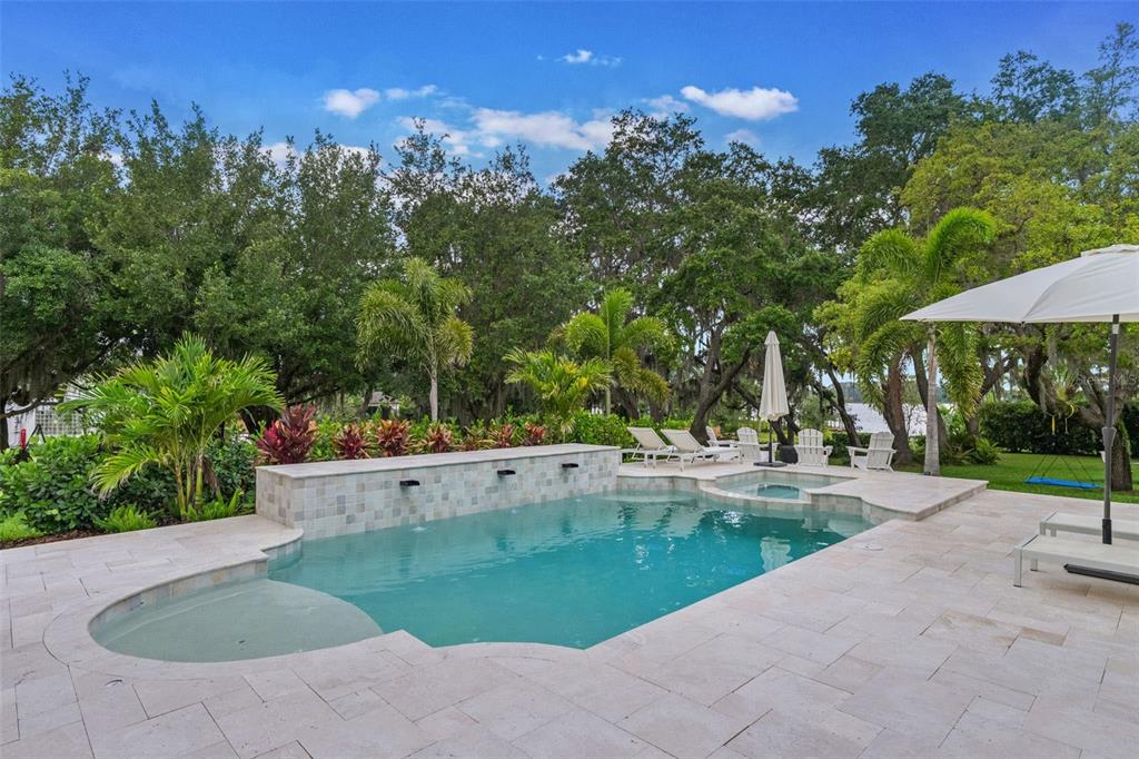 5351 Carson Street St. Cloud, FL 34771 - Photo 38 of 54 a view of a swimming pool with a patio