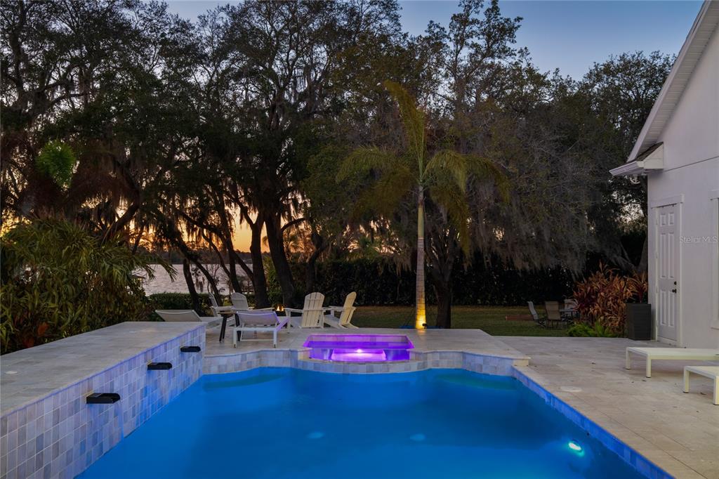 5351 Carson Street St. Cloud, FL 34771 - Photo 42 of 54 a view of outdoor space with swimming pool and trees