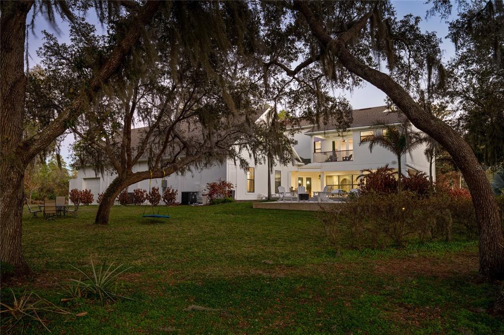 5351 Carson Street St. Cloud, FL 34771 - Photo 44 of 54 a view of a park with large trees