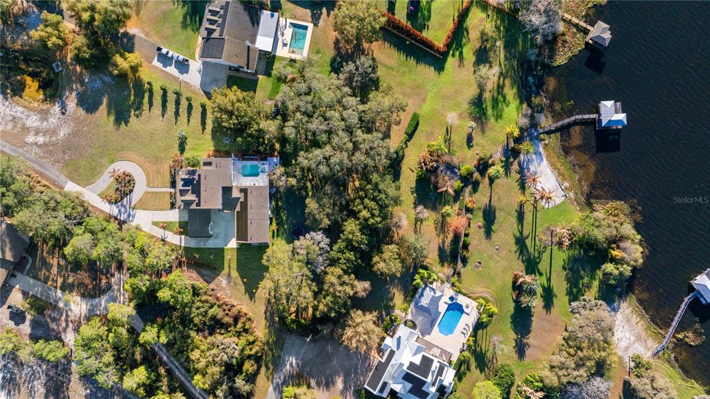 5351 Carson Street St. Cloud, FL 34771 - Photo 49 of 54 a backyard of a house with lots of green space