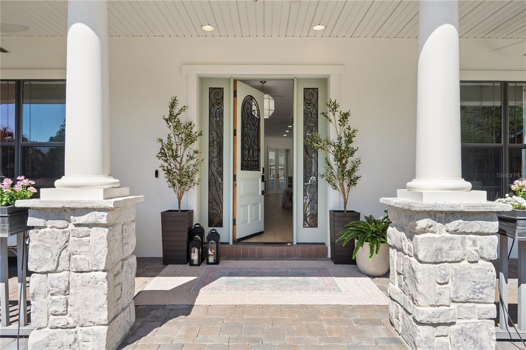 5351 Carson Street St. Cloud, FL 34771 - Photo 5 of 54 a front view of a house with garden