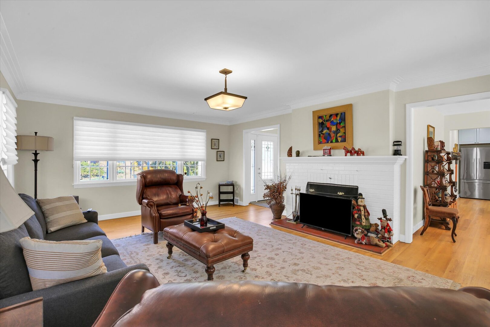 701 Hamilton Drive Champaign, IL 61820 - Photo 12 of 42 a living room with furniture and a fireplace