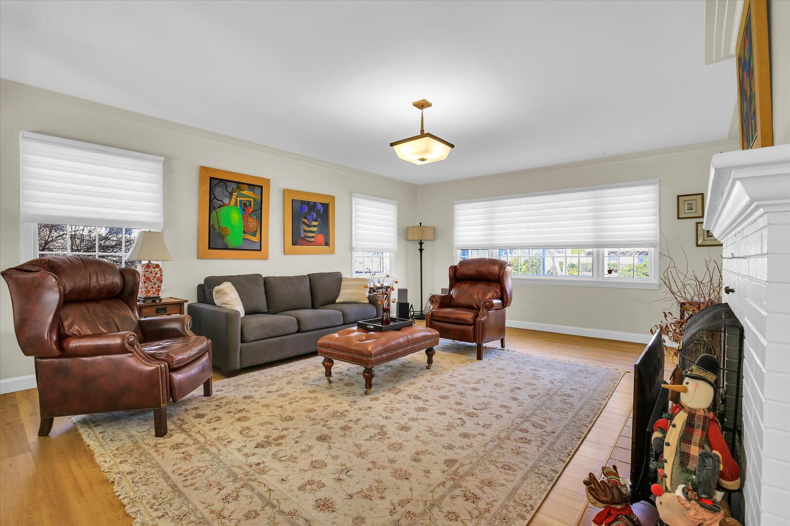 701 Hamilton Drive Champaign, IL 61820 - Photo 13 of 42 a living room with furniture a window and a flat screen tv