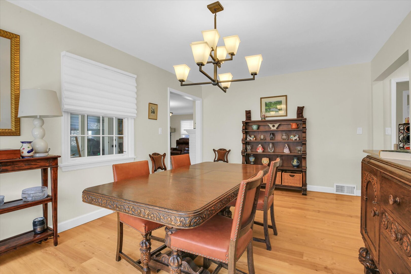 701 Hamilton Drive Champaign, IL 61820 - Photo 17 of 42 a view of a dining room with furniture and wooden floor