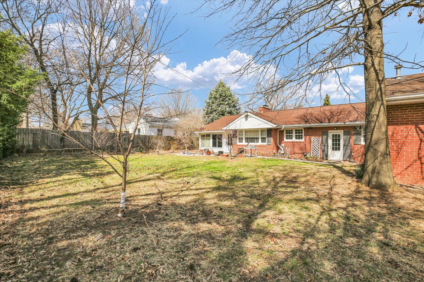 701 Hamilton Drive Champaign, IL 61820 - Photo 5 of 42 a view of house with outdoor space