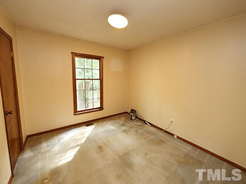 4821 Leven Lane Raleigh, NC 27616 - Photo 8 of 12 a view of an empty room with a window
