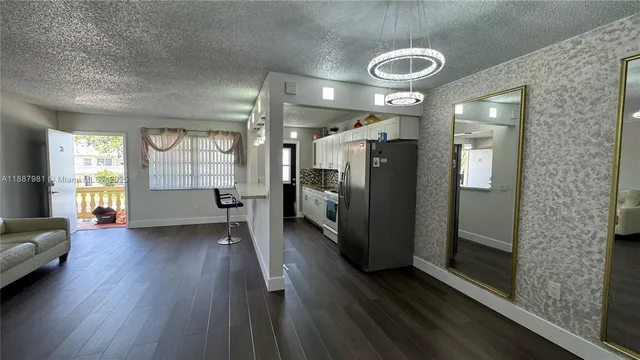 $130,000 | 160 Northeast 203rd Terrace, Unit E31, Miami Gardens, FL 33179