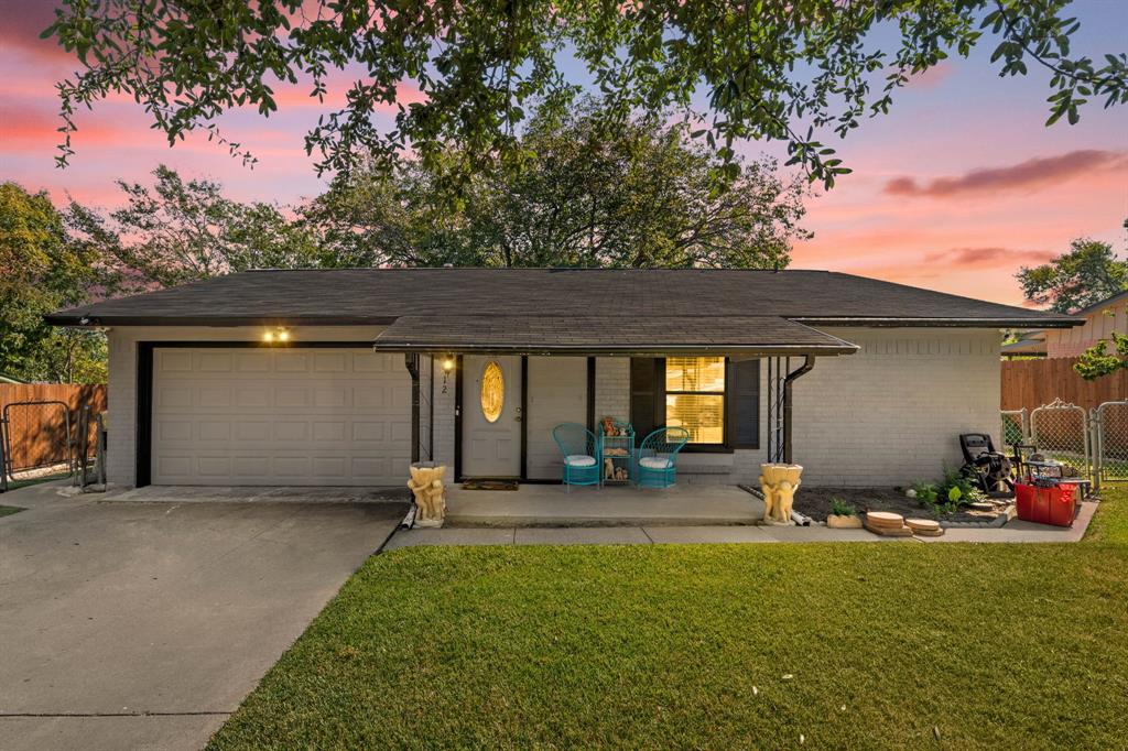 912 Crockett Street Midlothian, TX 76065 - Photo 1 of 29 a backyard of a house with table and chairs