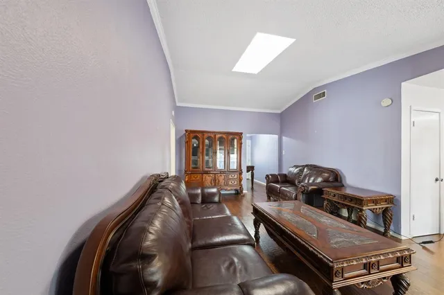 a room with furniture and a window