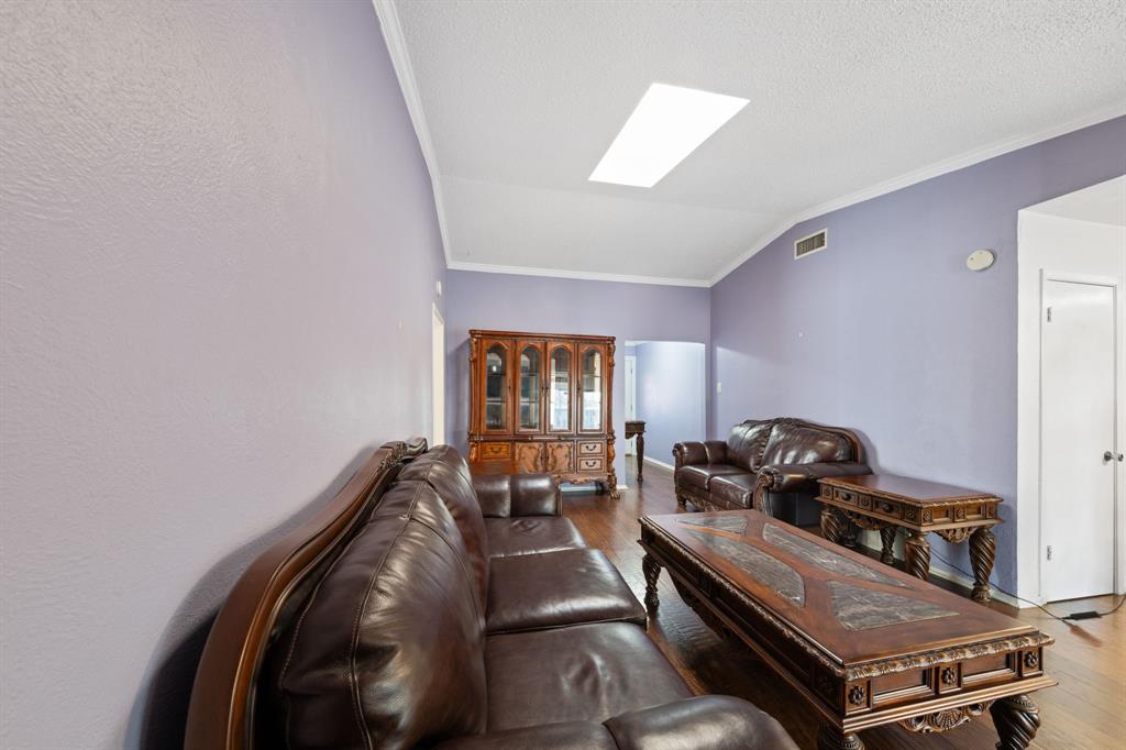 912 Crockett Street Midlothian, TX 76065 - Photo 16 of 29 a room with furniture and a window