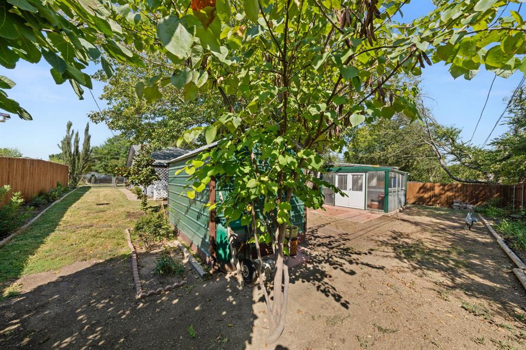 912 Crockett Street Midlothian, TX 76065 - Photo 22 of 29 a view of a house with a tree
