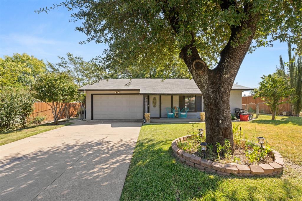 912 Crockett Street Midlothian, TX 76065 - Photo 29 of 29 a front view of a house with a yard