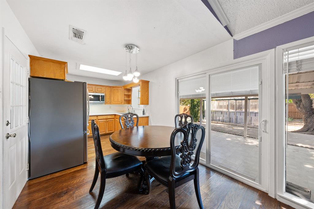 912 Crockett Street Midlothian, TX 76065 - Photo 8 of 29 a view of a dining room with furniture window and outside view