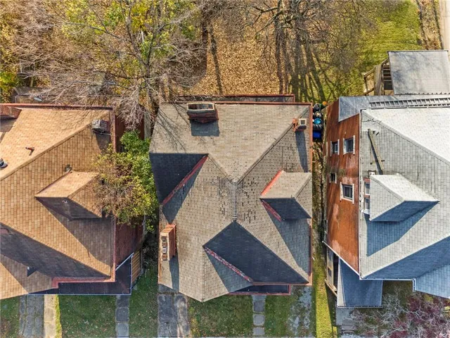 front view of house with a trees