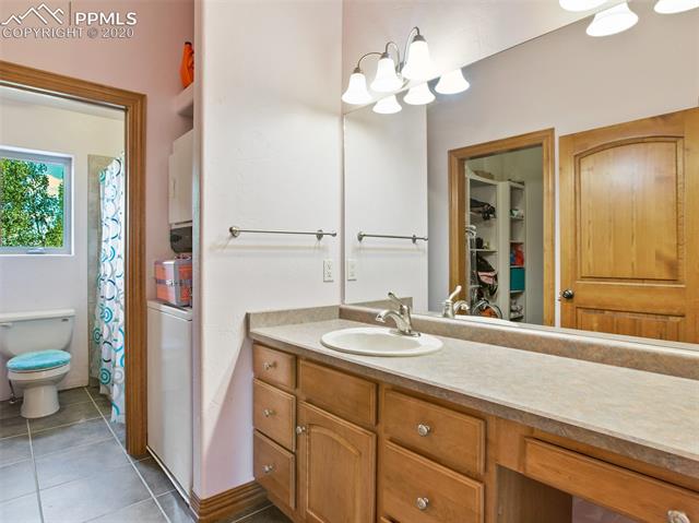 1471 Cedar Mountain Road Divide, CO 80814 - Photo 15 of 28 Upper level suite bathroom with laundry