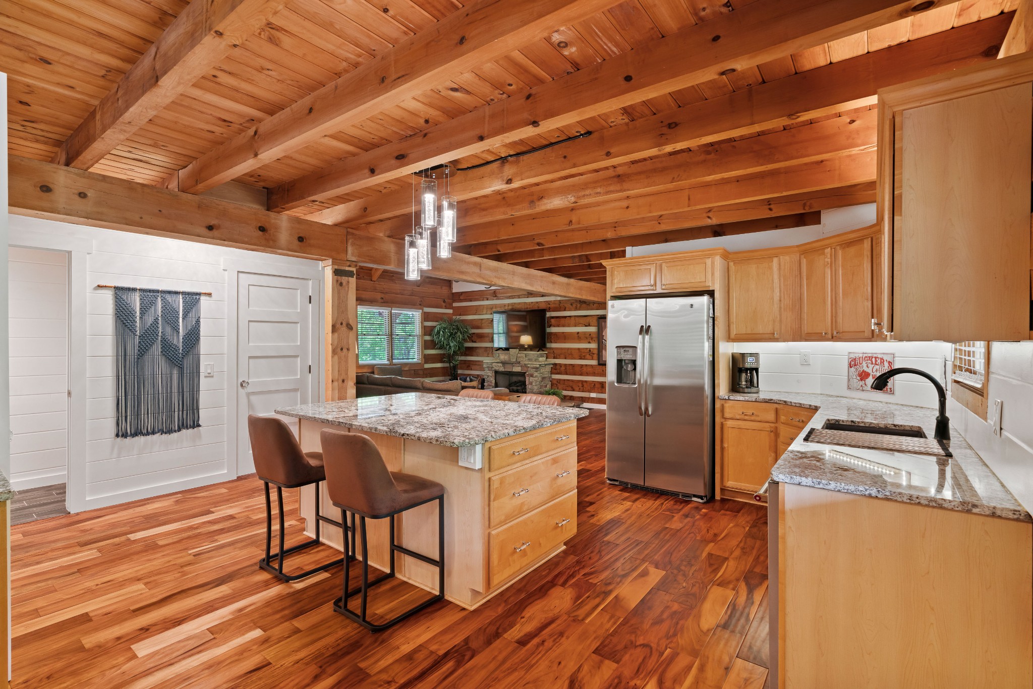 1708 Sugar Ridge Road Spring Hill, TN 37174 - Photo 21 of 70 a open kitchen with stainless steel appliances granite countertop a sink a stove and wooden floors