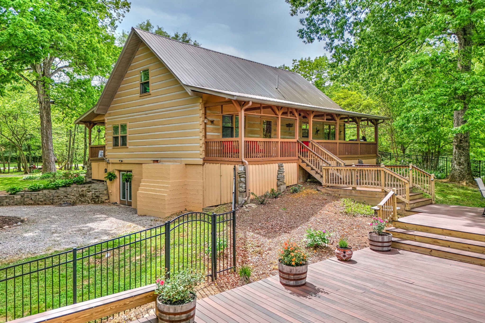 1708 Sugar Ridge Road Spring Hill, TN 37174 - Photo 47 of 70 a front view of a house with a garden and patio