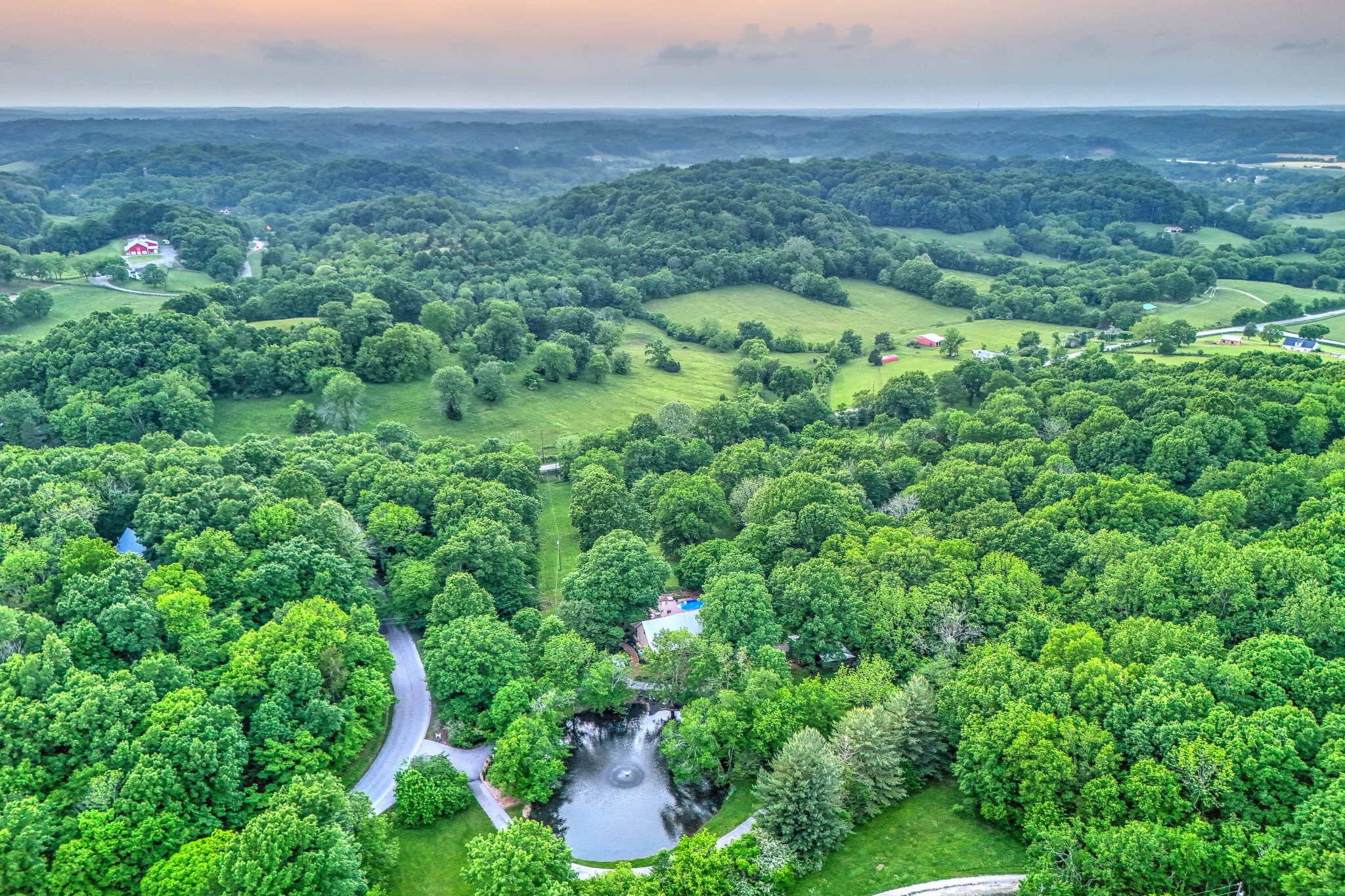 1708 Sugar Ridge Road Spring Hill, TN 37174 - Photo 56 of 70 an aerial view of residential houses with outdoor space and trees